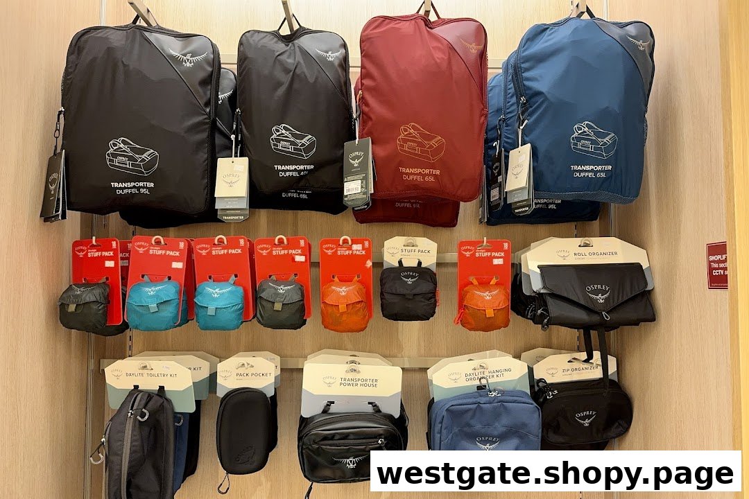 Display of Osprey travel bags, duffels, and organizing accessories.