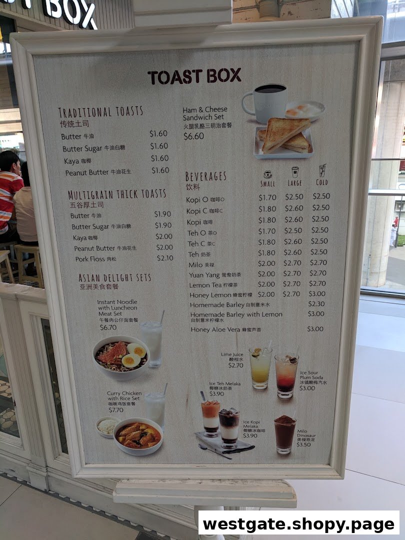 A detailed menu board for Toast Box, showcasing traditional toasts, Asian delight sets, and various beverages.