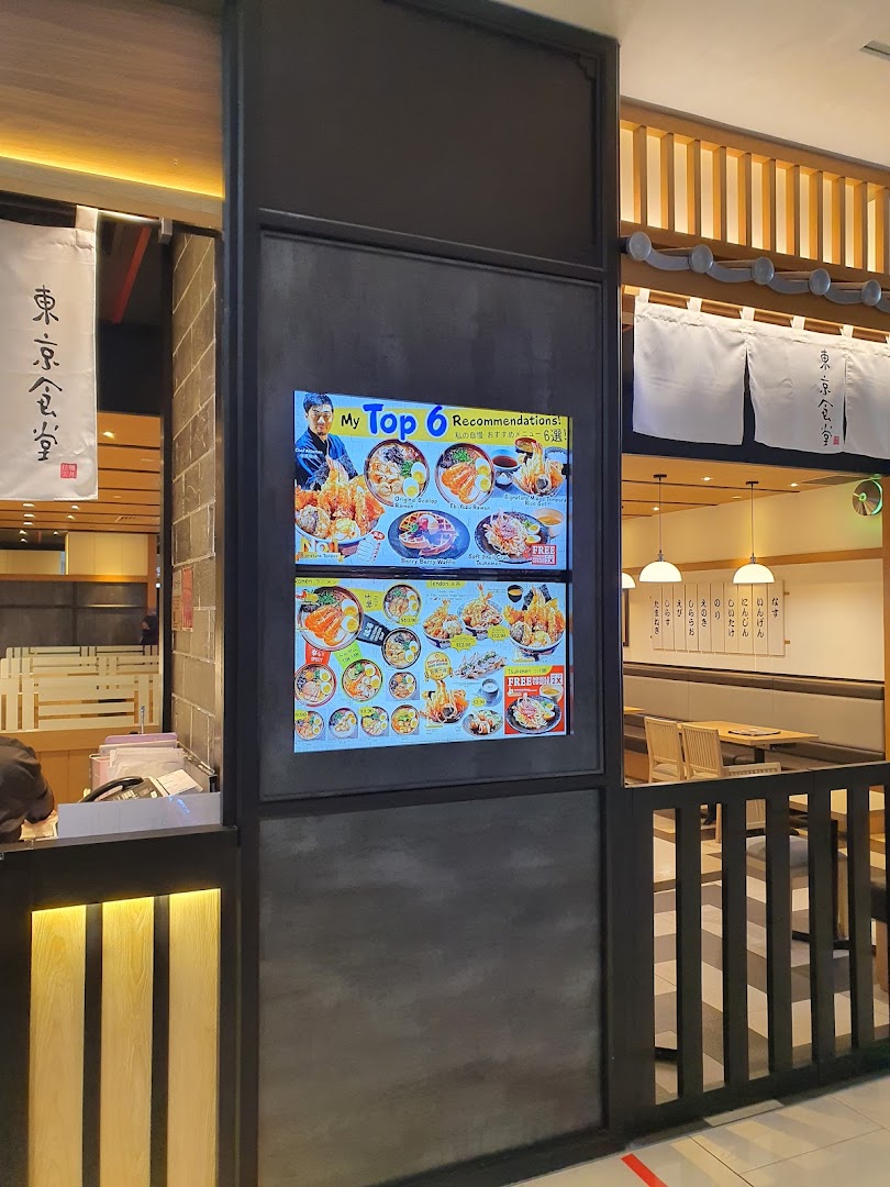 Digital display showcasing recommended dishes at Tokyo Shokudo Westgate's inviting entrance.