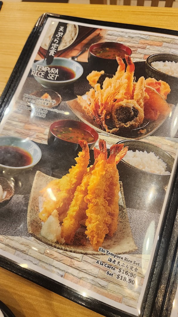 A menu page displaying various Japanese tempura rice sets with their respective prices and images.
