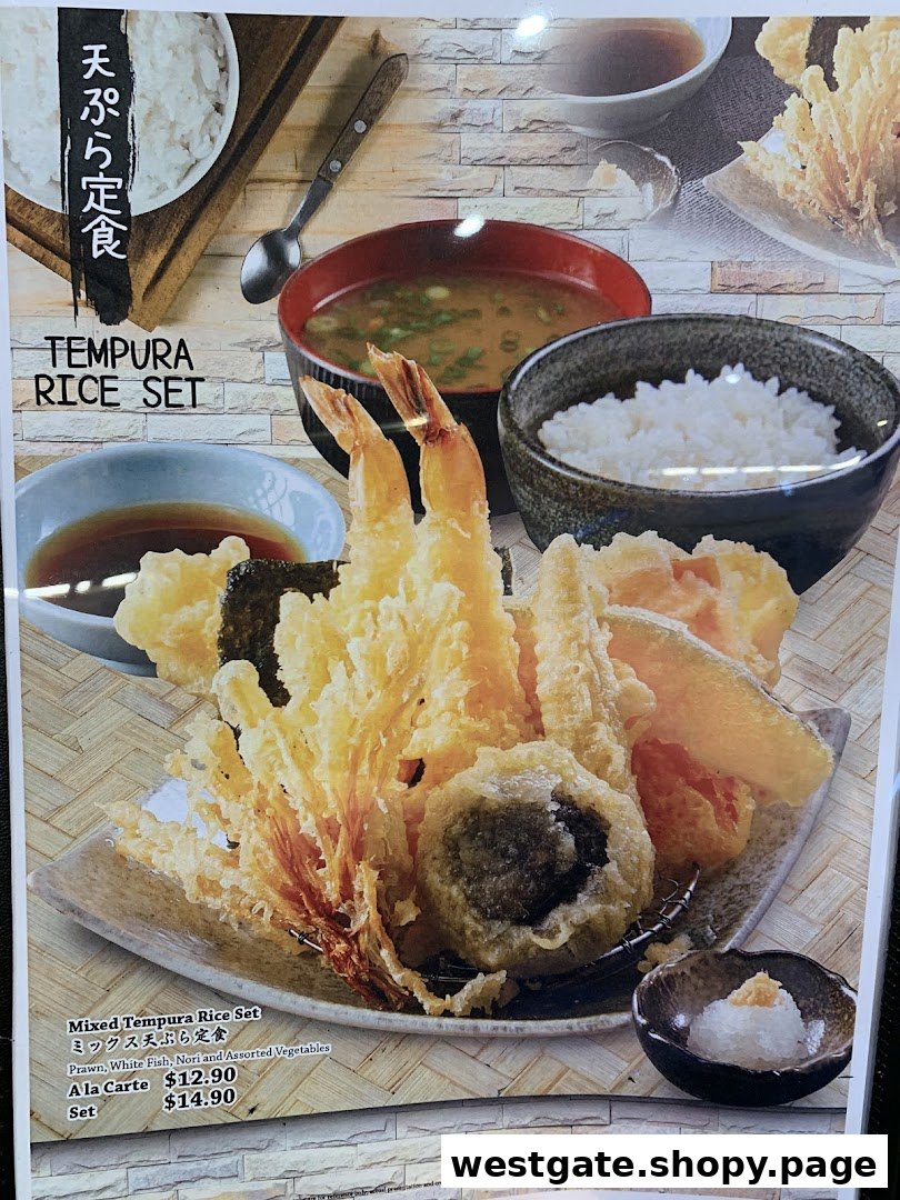 A vibrant image showcasing a Mixed Tempura Rice Set with prawns, fish, nori, and vegetables.