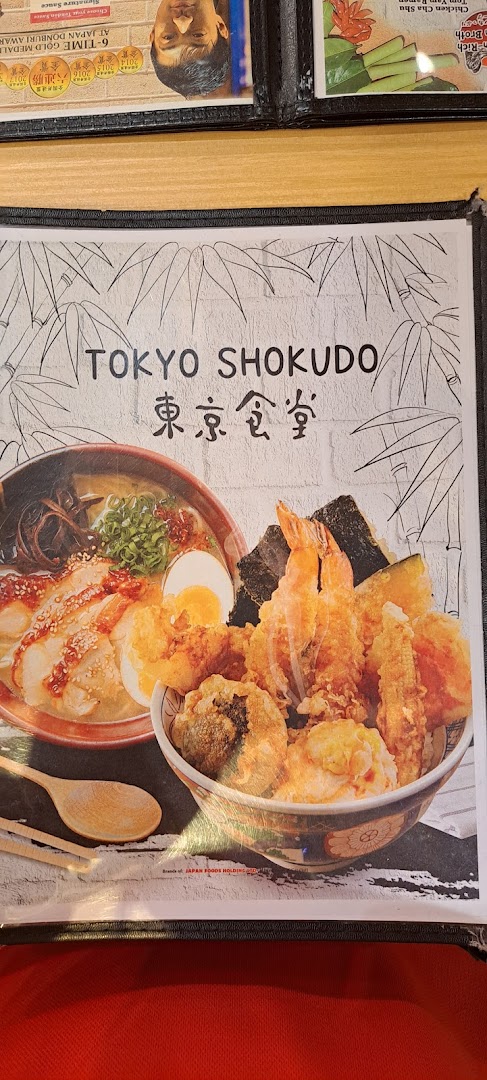 A menu cover for Tokyo Shokudo featuring vibrant images of ramen and tempura donburi.