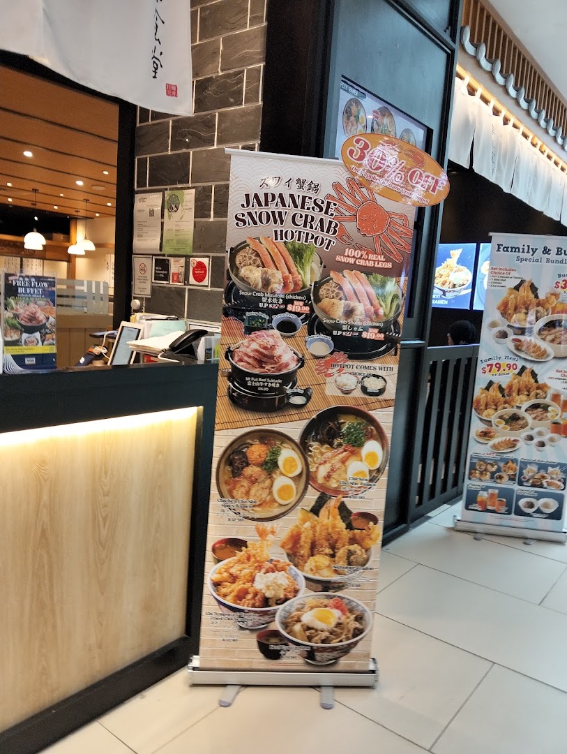 Promotional banners showcasing Japanese Snow Crab Hotpot and other dishes at Tokyo Shokudo Westgate's entrance.