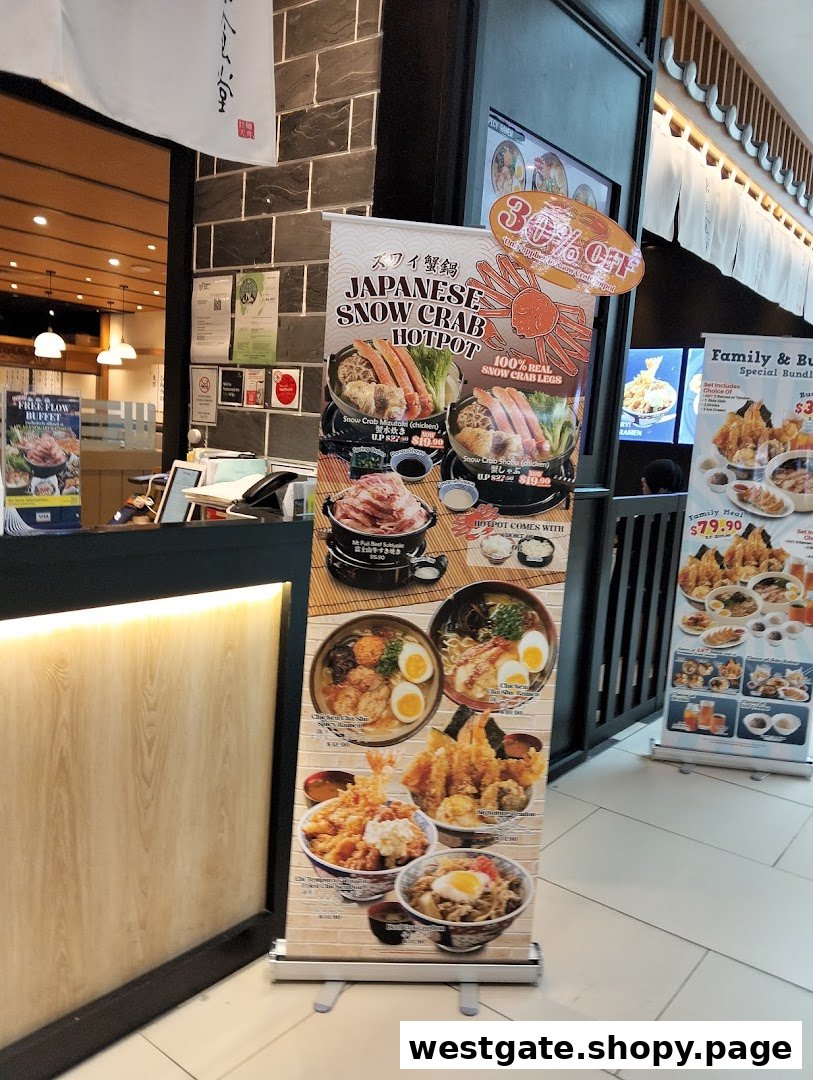 Promotional banners showcasing Japanese Snow Crab Hotpot and other dishes at Tokyo Shokudo Westgate's entrance.