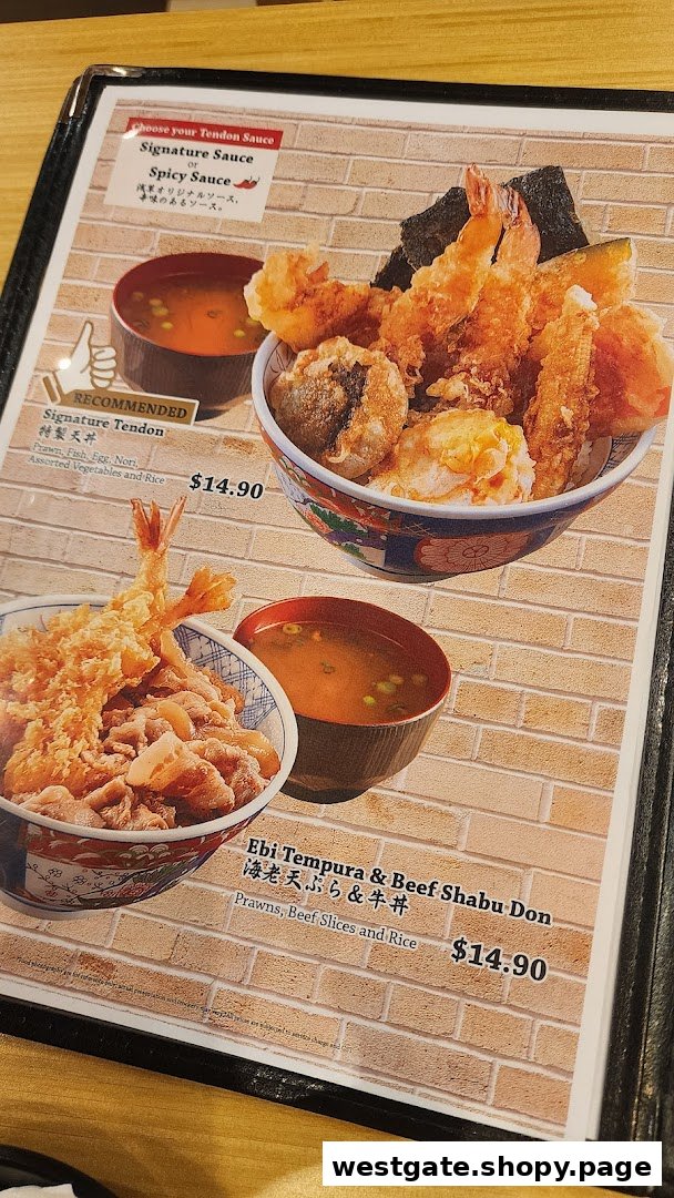 A menu page displaying two Japanese rice bowls: Signature Tendon and Ebi Tempura & Beef Shabu Don.