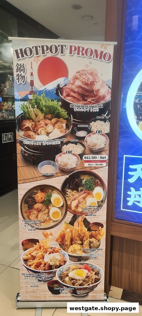 A promotional standee displaying various Japanese hotpot, ramen, and donburi dishes with prices.
