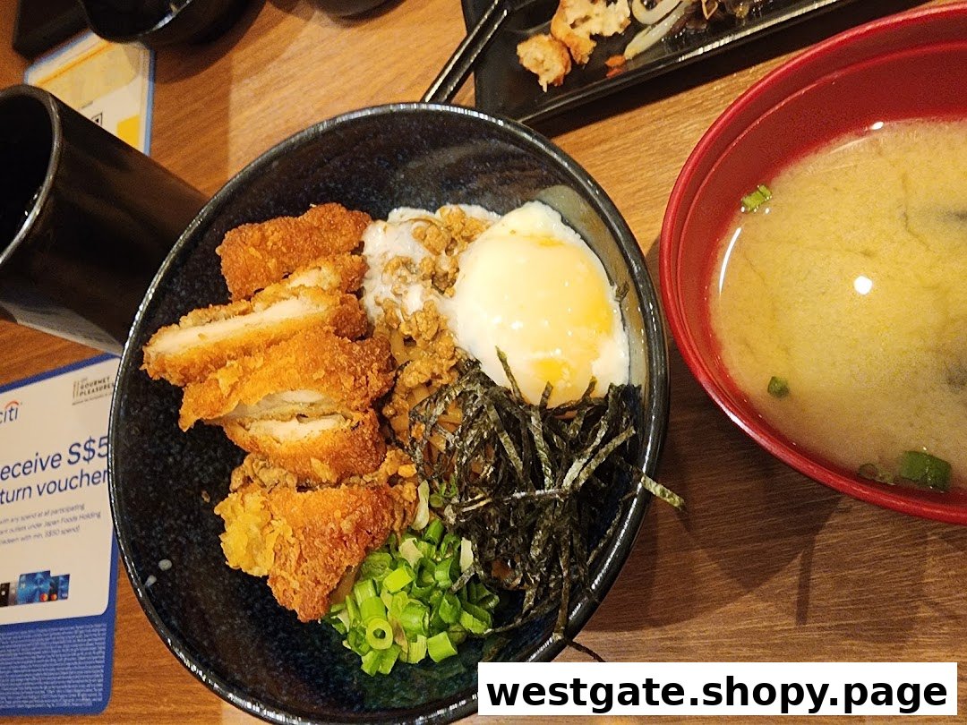 A delicious katsu don with a poached egg, seaweed, and spring onions, served with miso soup.