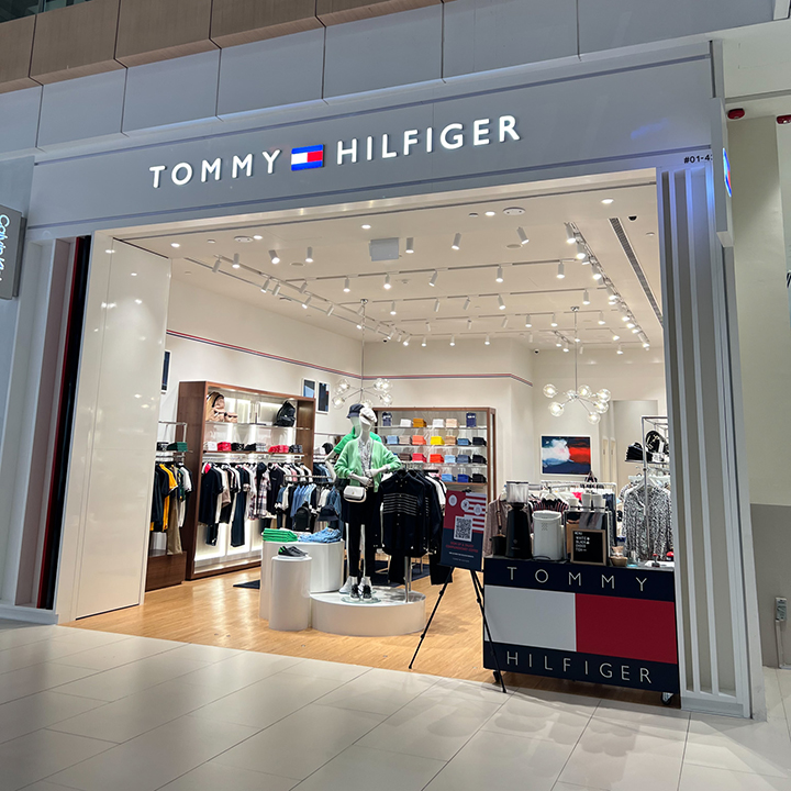 The Tommy Hilfiger shop front at Westgate, showcasing its vibrant interior and classic American style.