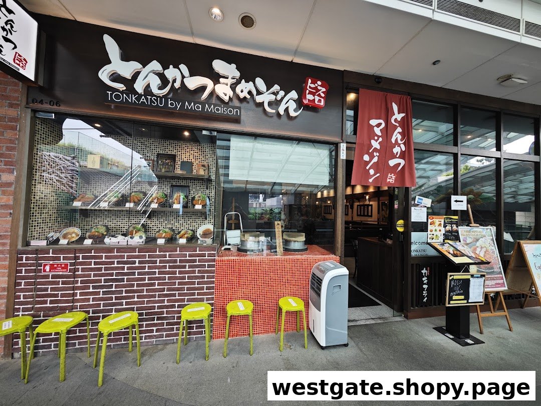The inviting storefront of Tonkatsu by Ma Maison, featuring a display window with food models and entrance.