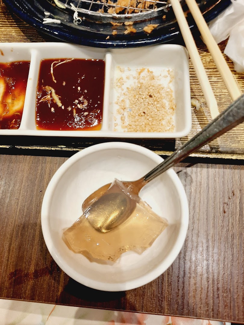 A close-up of a refreshing dessert and condiments, showcasing a delightful dining experience.