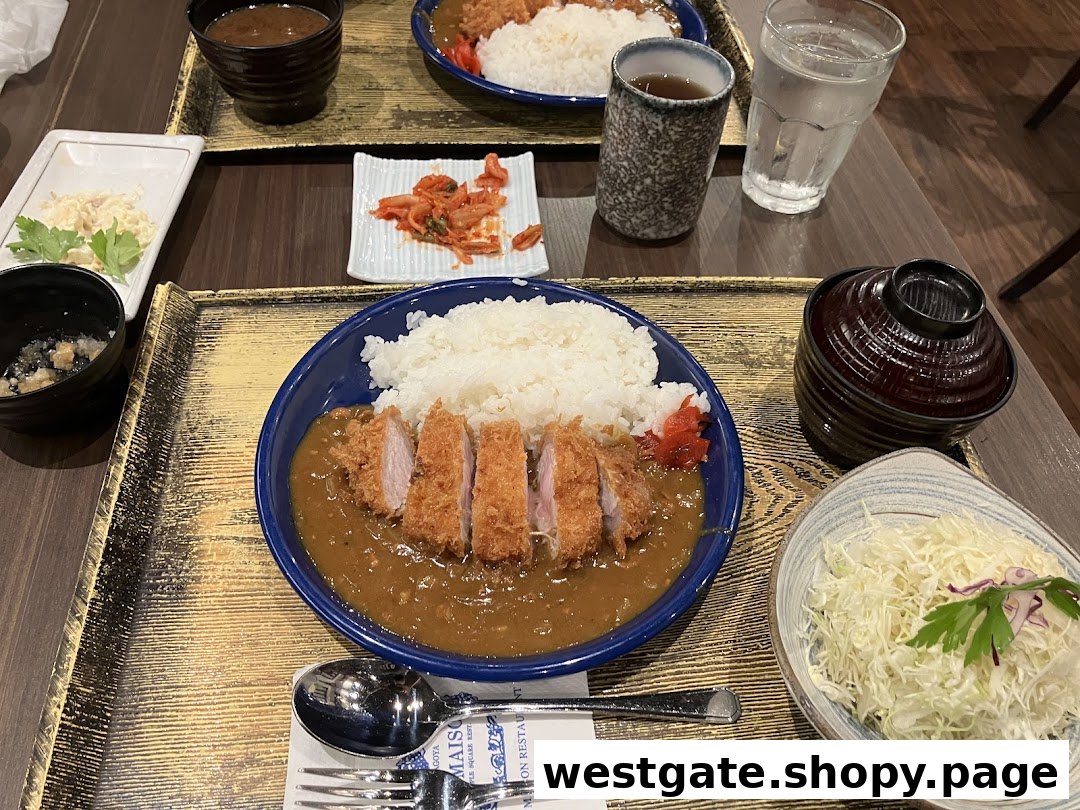 Two delicious Tonkatsu curry rice sets with various sides, showcasing a satisfying Japanese meal.