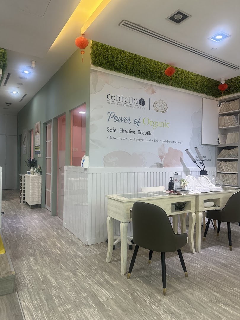 Interior view of a beauty and wellness salon featuring treatment areas and organic cosmetic branding.
