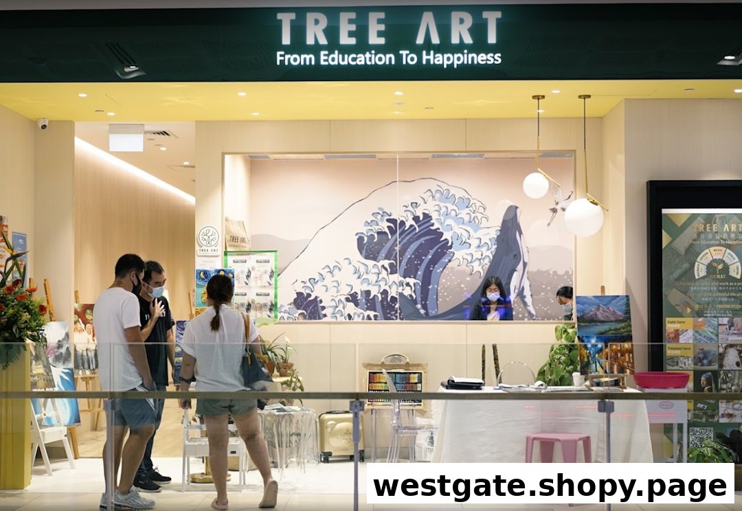 The shop front of Tree Art Jurong East Campus, featuring a large wave mural, art displays, and people.