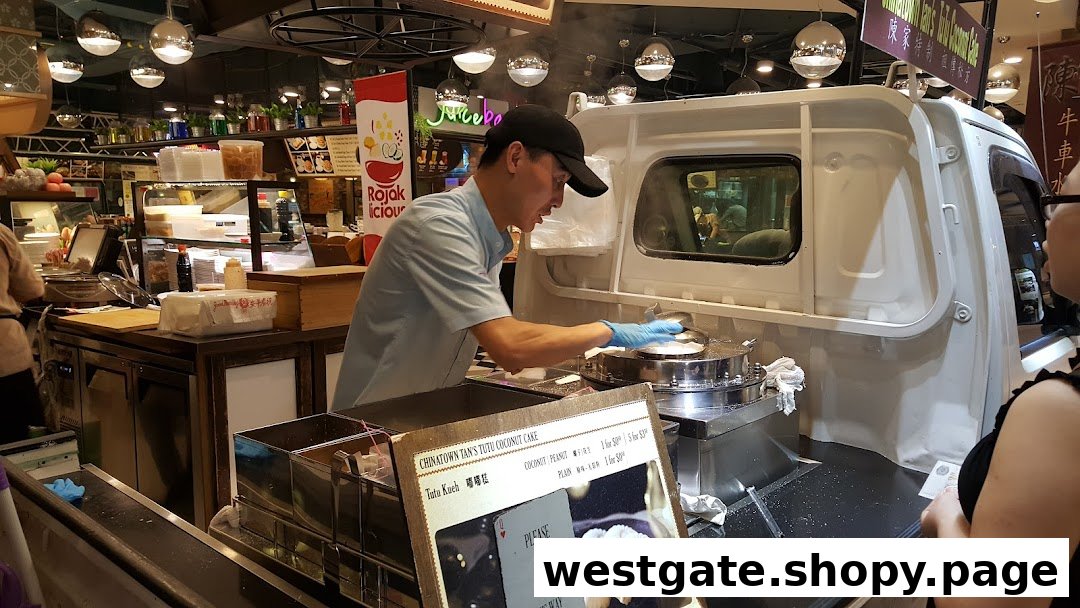 A vendor prepares traditional Tutu Kueh (coconut cakes) with a visible menu board displaying prices.