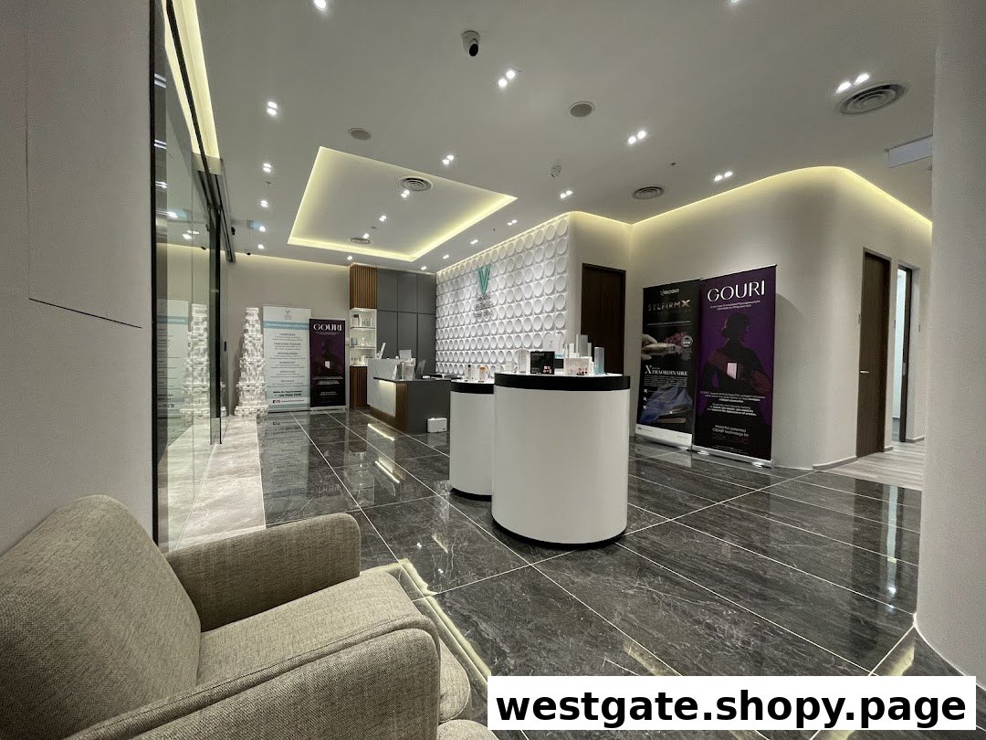 Modern and spacious interior of V Medical Aesthetics & Laser Clinic, showcasing a waiting area, reception, and product displays.