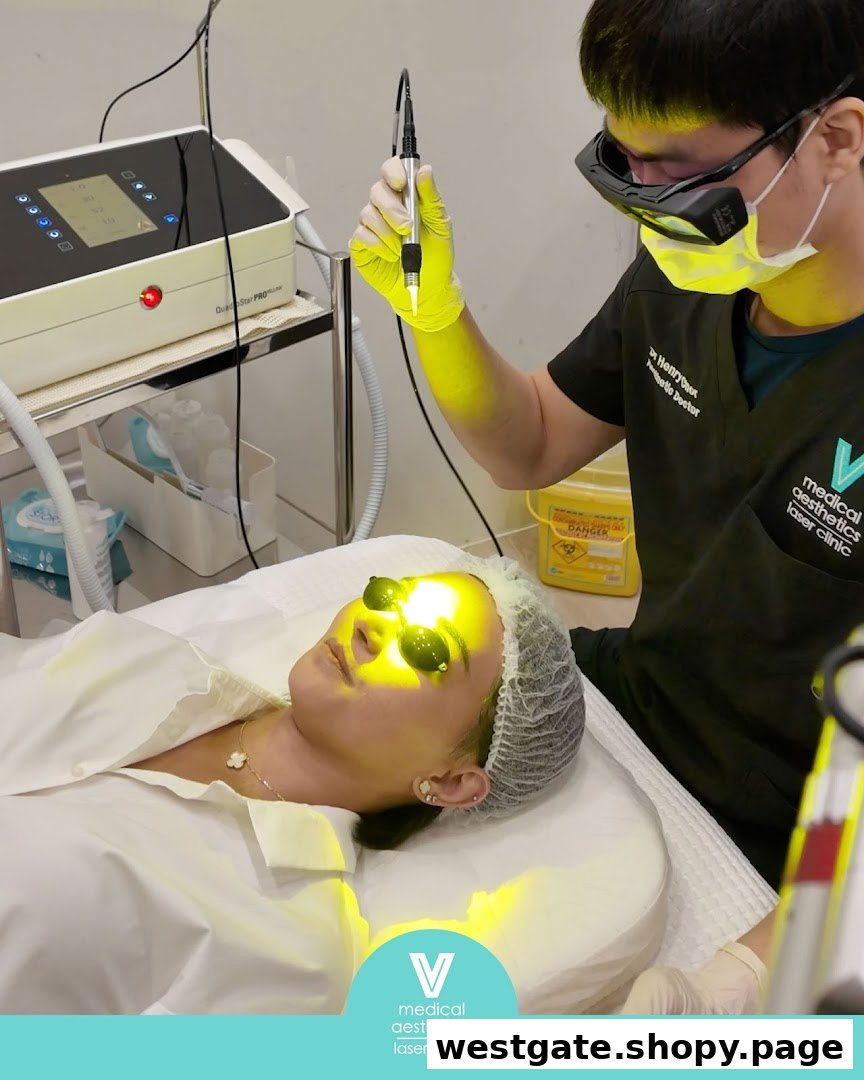 A patient receives a laser aesthetic treatment from a doctor at V Medical Aesthetics & Laser Clinic.
