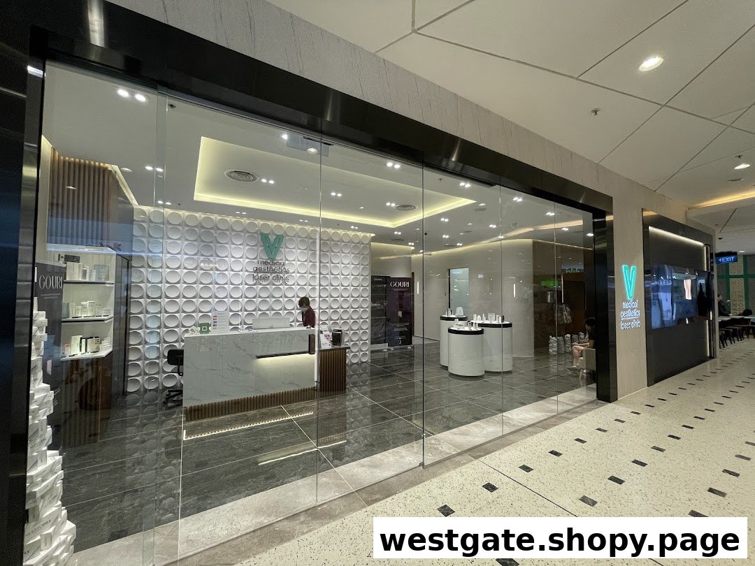 The modern glass shopfront of V Medical Aesthetics & Laser Clinic, revealing its reception area and interior.
