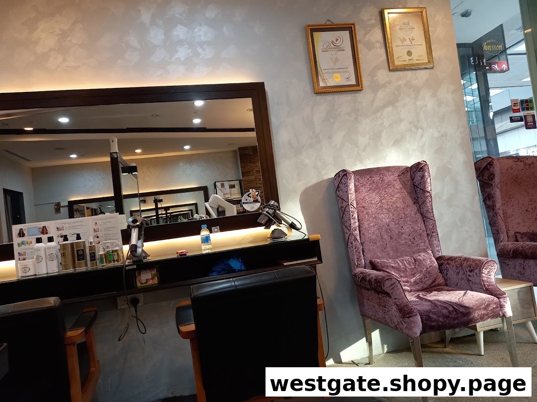 Interior view of Vintage Studio VS Salon, showing styling stations, products, and plush waiting chairs.