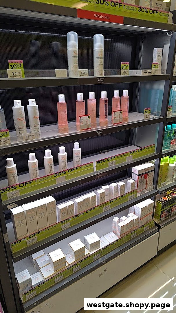 A retail display shelf showcasing various Avene skincare products with prominent 30% off signs.