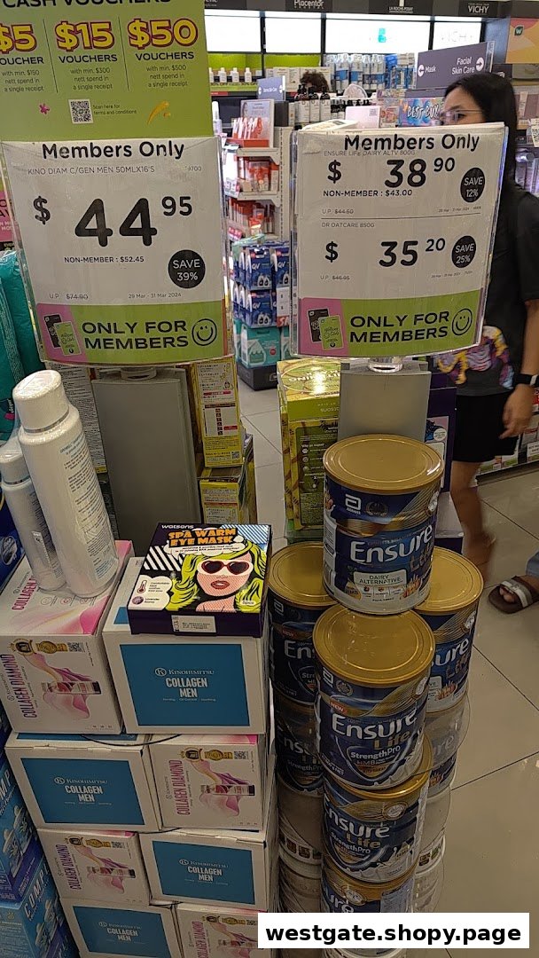 Promotional displays for health and beauty products, including collagen and nutritional drinks, inside a Watsons store.