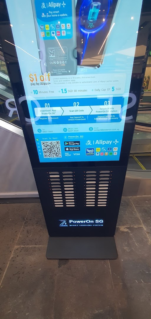 A PowerOn SG mobile charging station with a digital display for power bank rental.