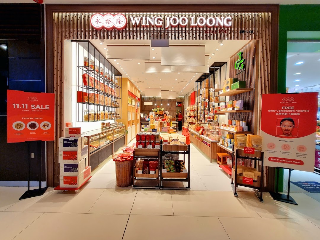 The inviting entrance of Wing Joo Loong, showcasing traditional health products and ongoing promotions.