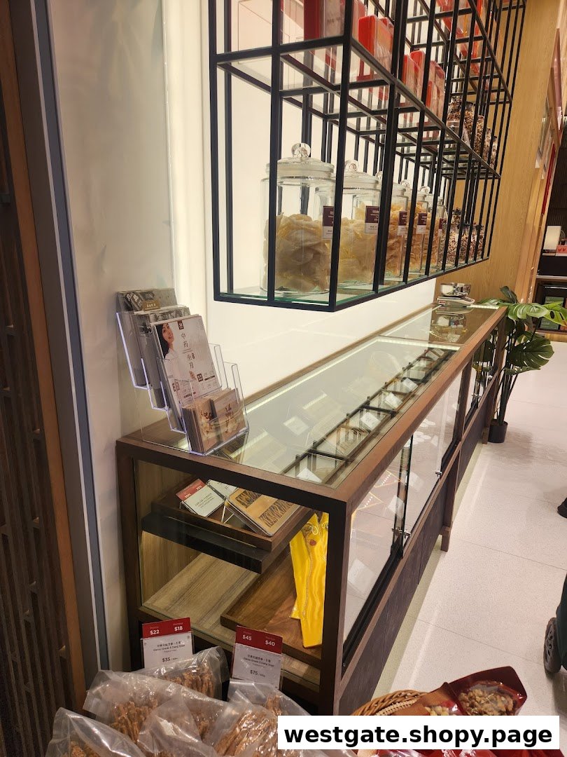 Interior view of WJL 永裕隆, showcasing traditional dried goods and snacks on modern display shelves and a glass counter.