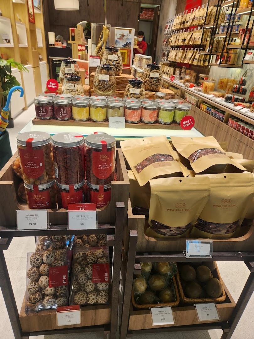 An interior shot of a retail shop displaying various dried goods, herbs, and traditional health products.