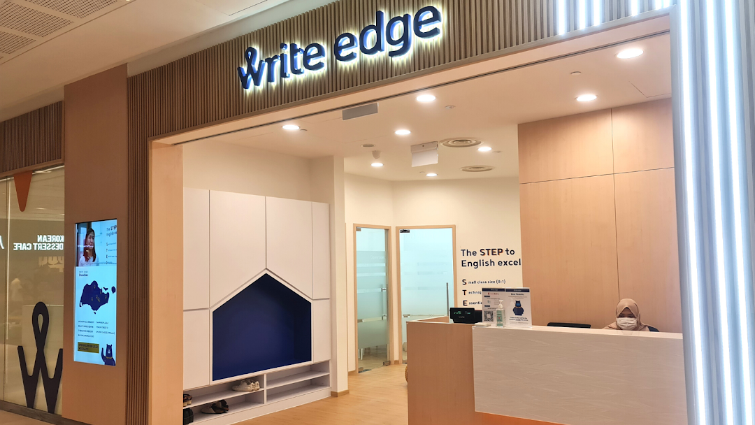 The bright and modern entrance of Write Edge, an English enrichment center, with its prominent signage.