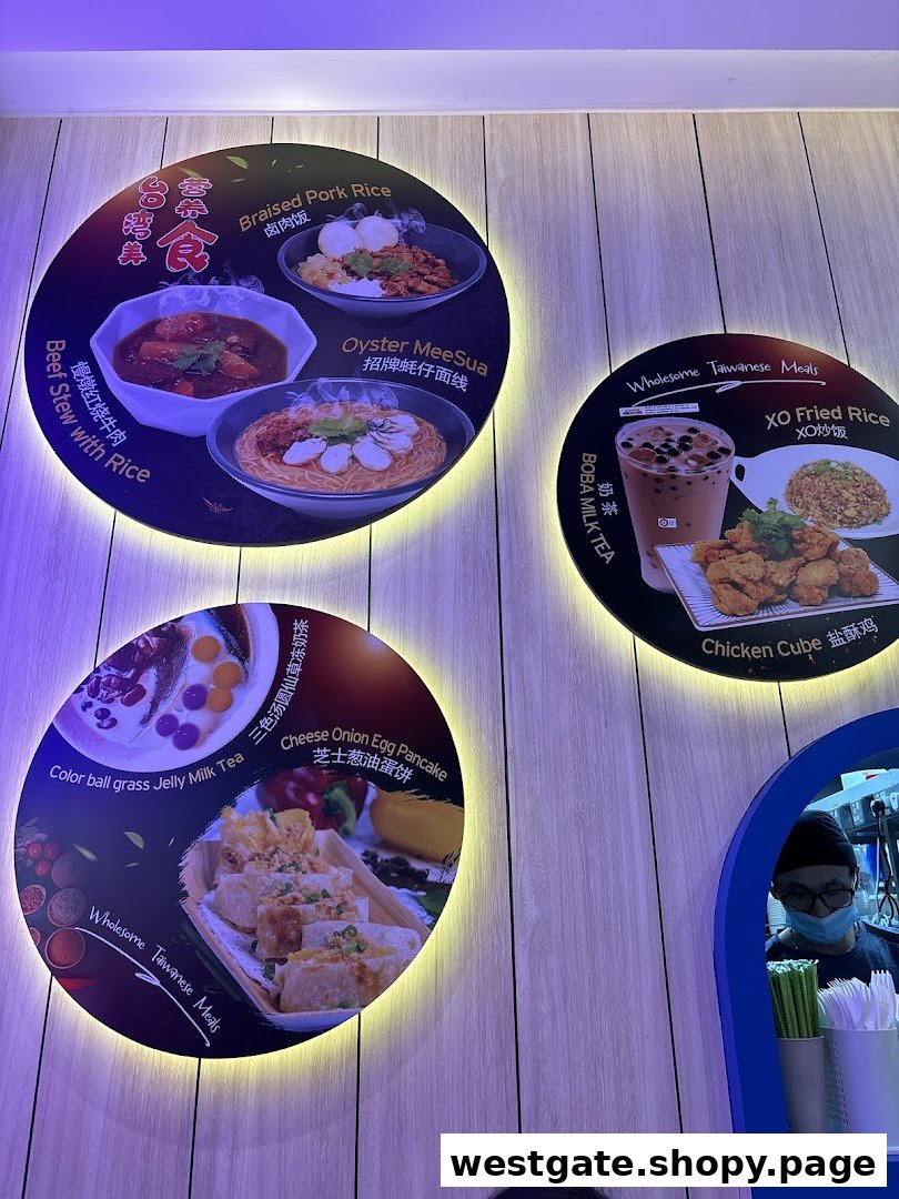 Illuminated wall displays showcase a variety of wholesome Taiwanese meals and beverages, including rice dishes, noodles, and bubble tea.