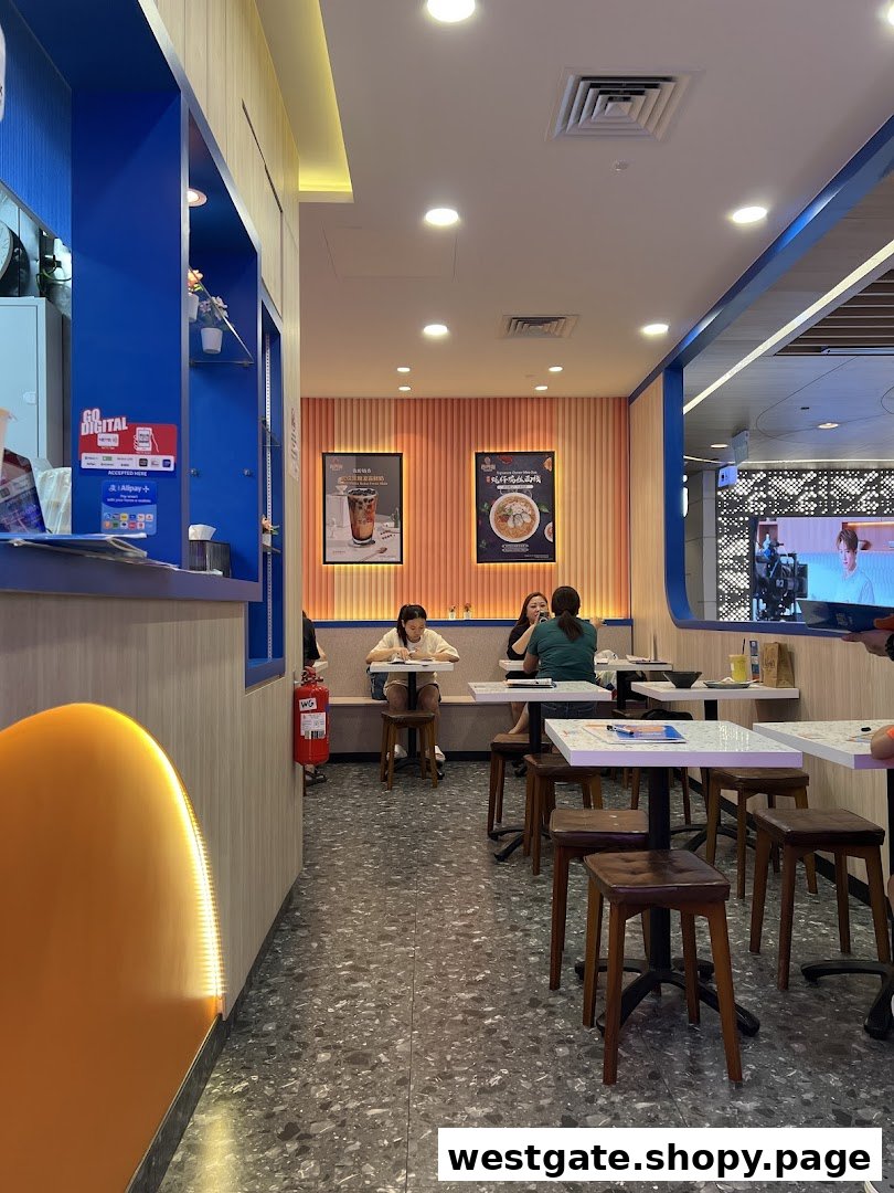 Interior view of Xi Men Jie Taiwanese restaurant, featuring customers dining in a modern, cozy setting.