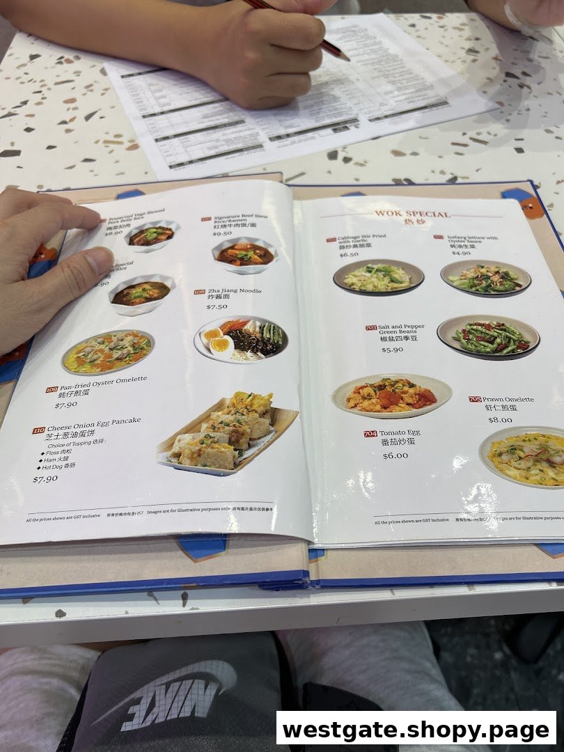 A customer's hands holding an open menu displaying various Taiwanese dishes and their prices.