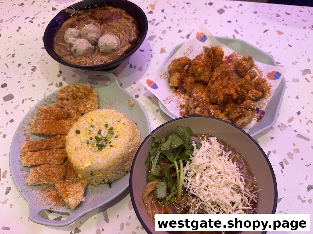 A vibrant spread of authentic Taiwanese dishes including fried chicken, noodles, and pork chop with fried rice.
