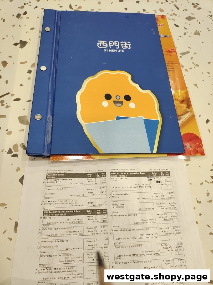 A detailed menu from Xi Men Jie, showcasing a variety of Taiwanese bubble teas and fresh milk drinks.