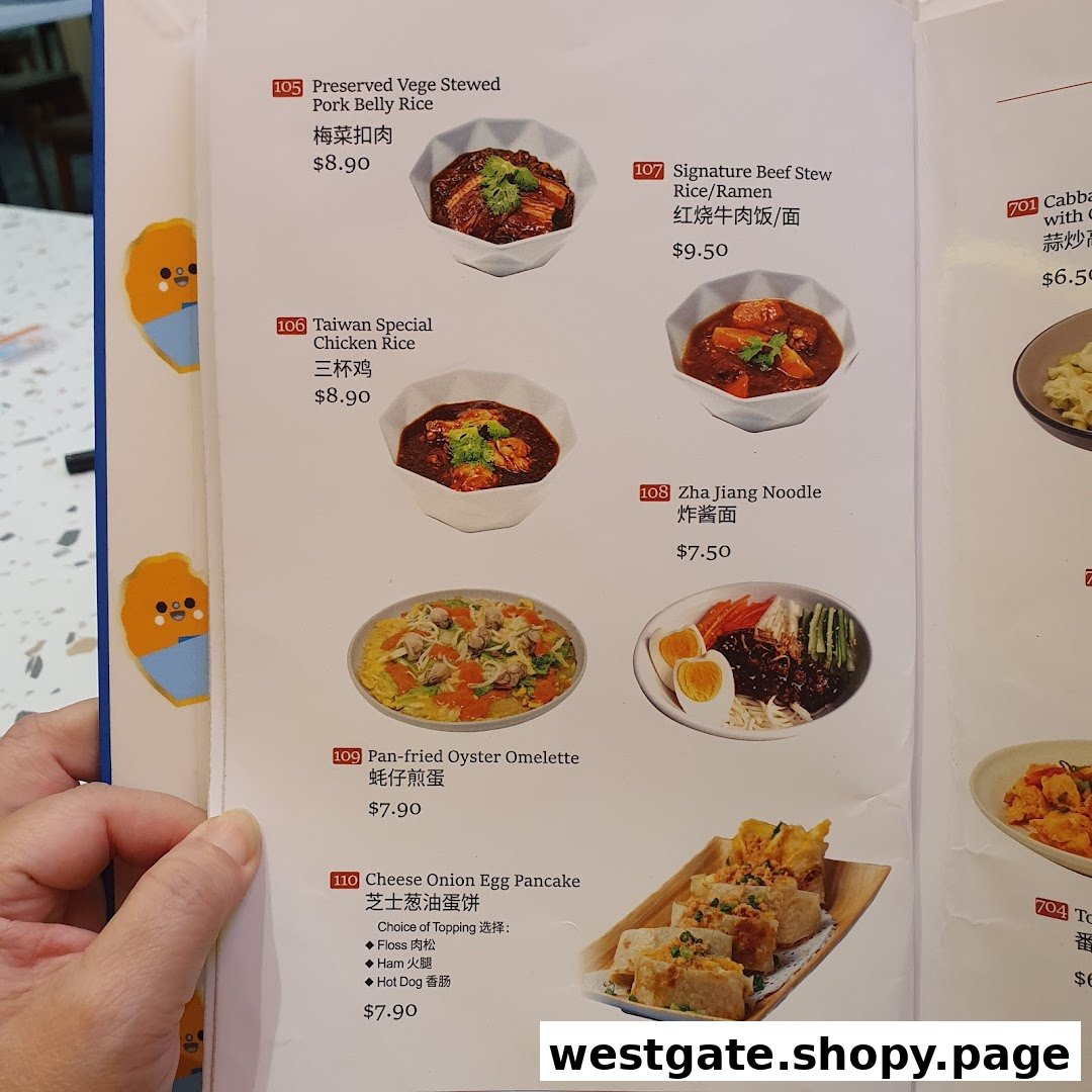A close-up view of a menu page displaying various Taiwanese main dishes with prices and images.