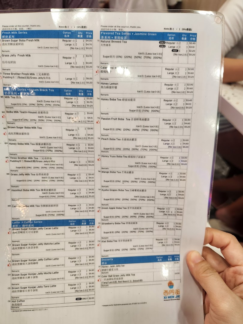 A detailed menu from Xi Men Jie, featuring a variety of fresh milk, milk tea, coffee, and flavored tea beverages, plus desserts.