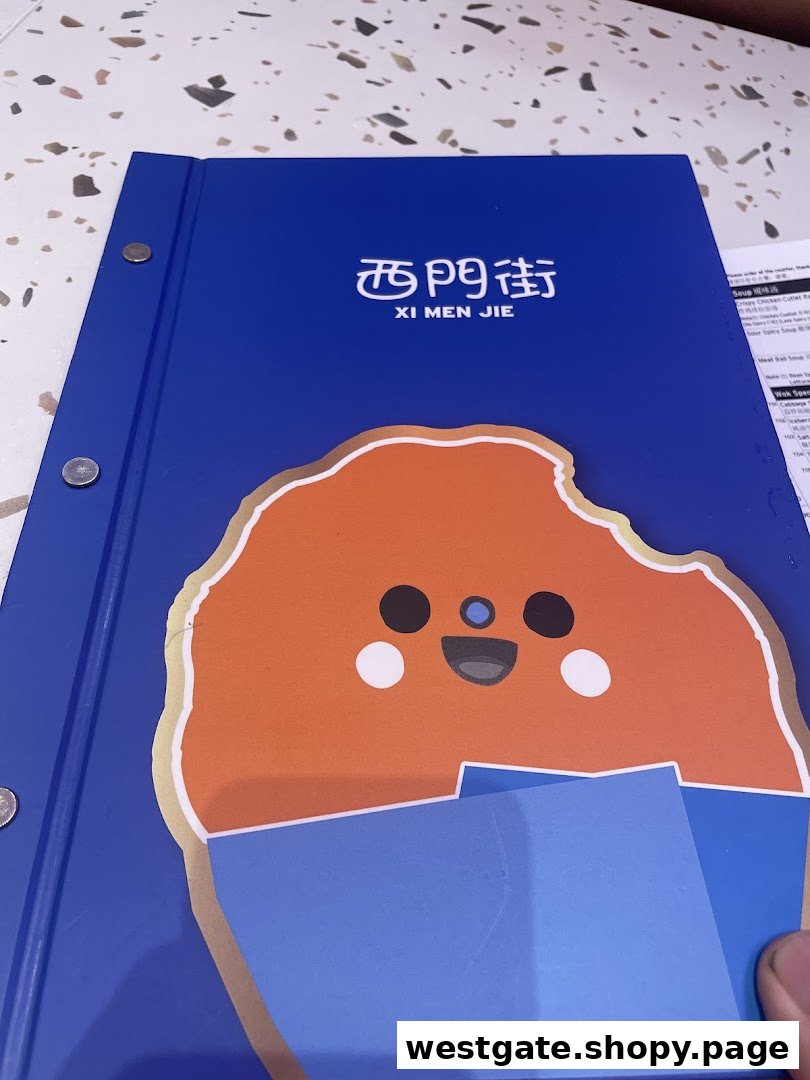A vibrant blue menu cover for Xi Men Jie featuring a cute, smiling character design.