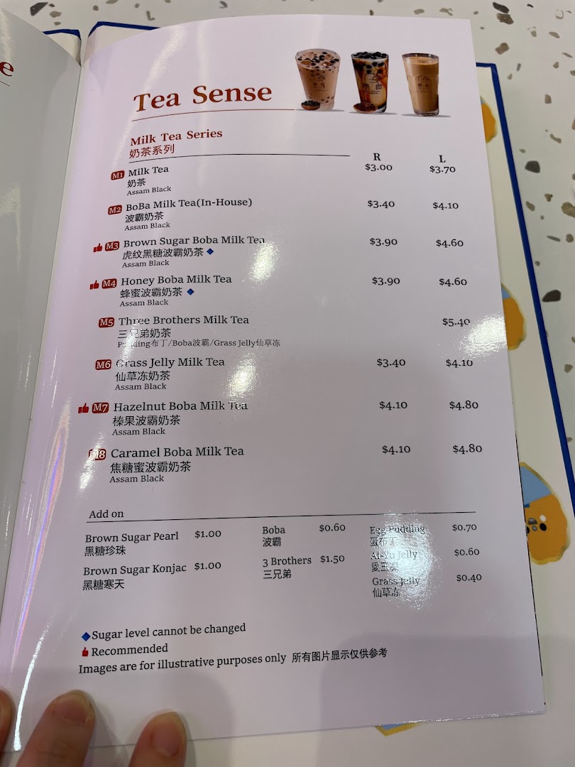 A detailed menu page showcasing milk tea series and various add-ons from Xi Men Jie.