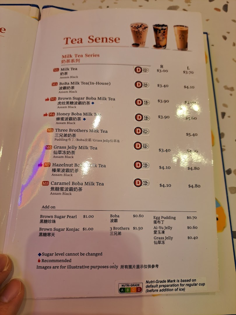 A detailed menu page showcasing a variety of milk teas and add-ons from 'Tea Sense'.