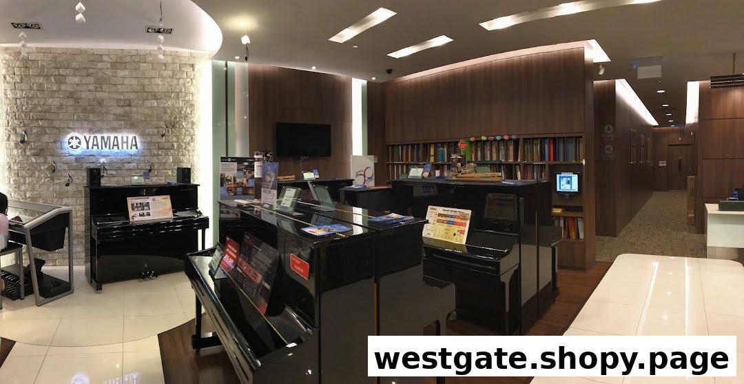 Interior view of the Yamaha Music Store, showcasing pianos and a music school area.