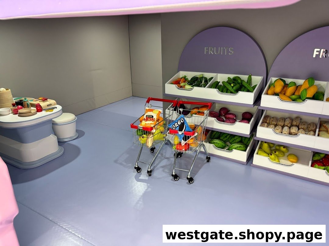 A vibrant play area at Yooland featuring a miniature supermarket with toy fruits, vegetables, and shopping carts.