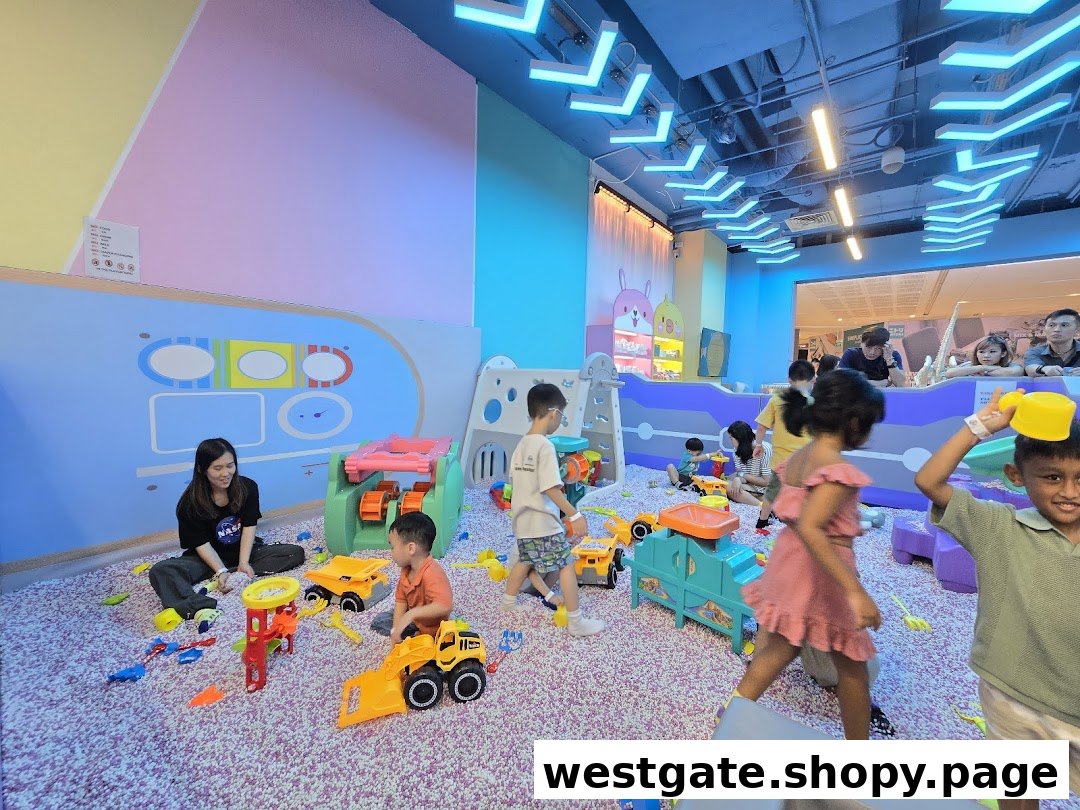 Children and an adult playing with toys in a colorful indoor play area at Yooland.