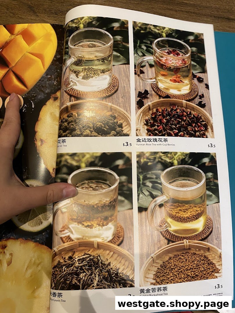 A menu page from YUN NANS featuring various tea selections with images, names, and prices.