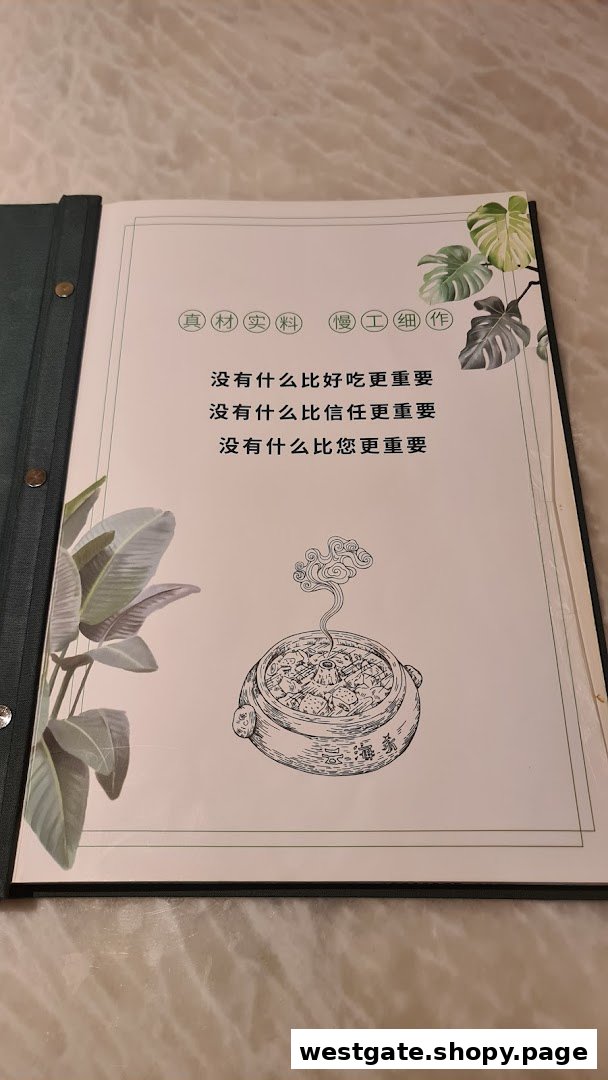 An open menu book page from YUN NANS, featuring the restaurant's philosophy and a hotpot illustration.
