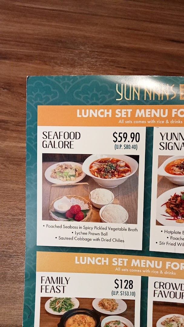 A close-up of YUN NANS' lunch set menu, featuring 'Seafood Galore' and 'Family Feast' options.